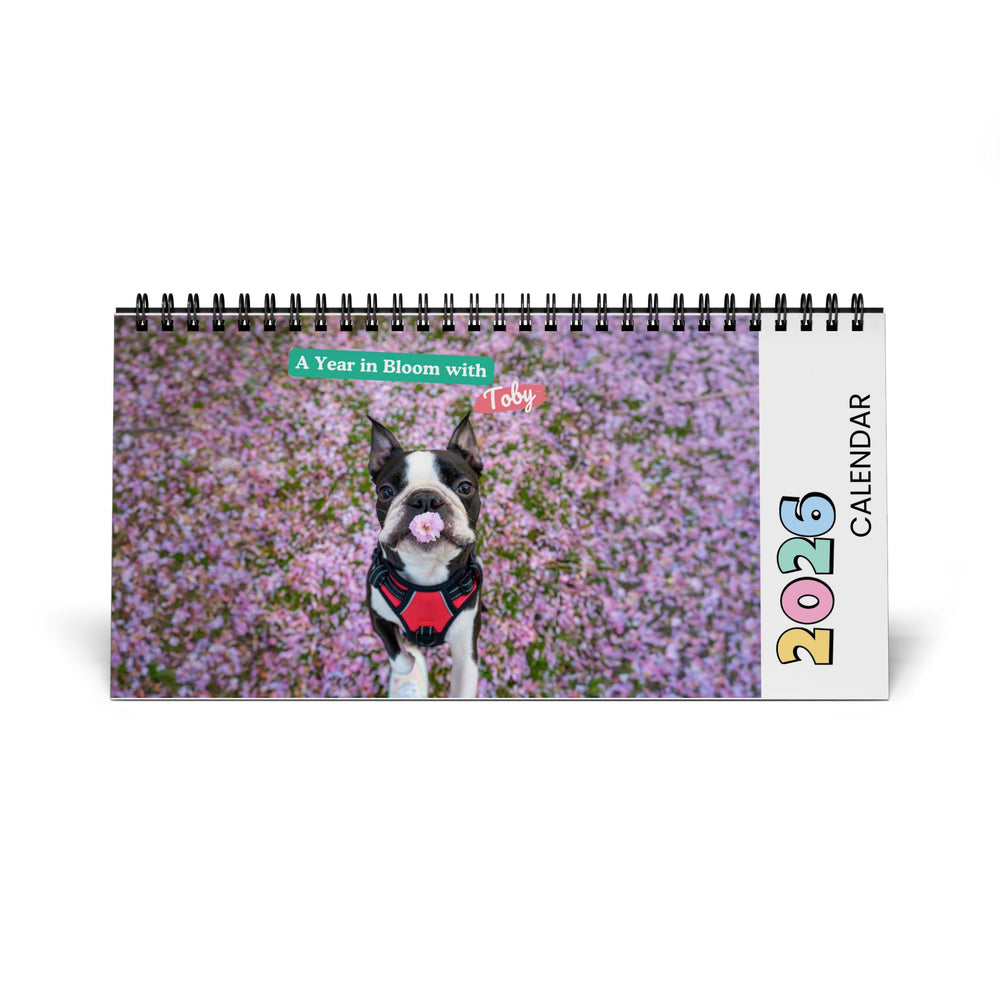2026 calendar with a dog in a field of flowers on the cover