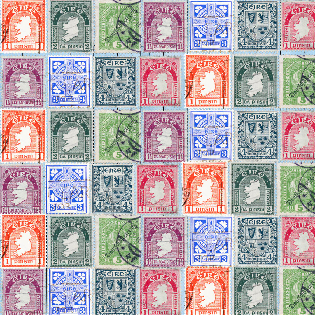 A grid of vintage Irish postage stamps,  designs in multiple colors including orange, green, blue, purple, and red, with black cancellation marks.