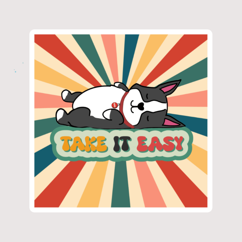 A cartoon sticker of a Boston terrier dog sitting with the words 'TAKE IT EASY' next to it.