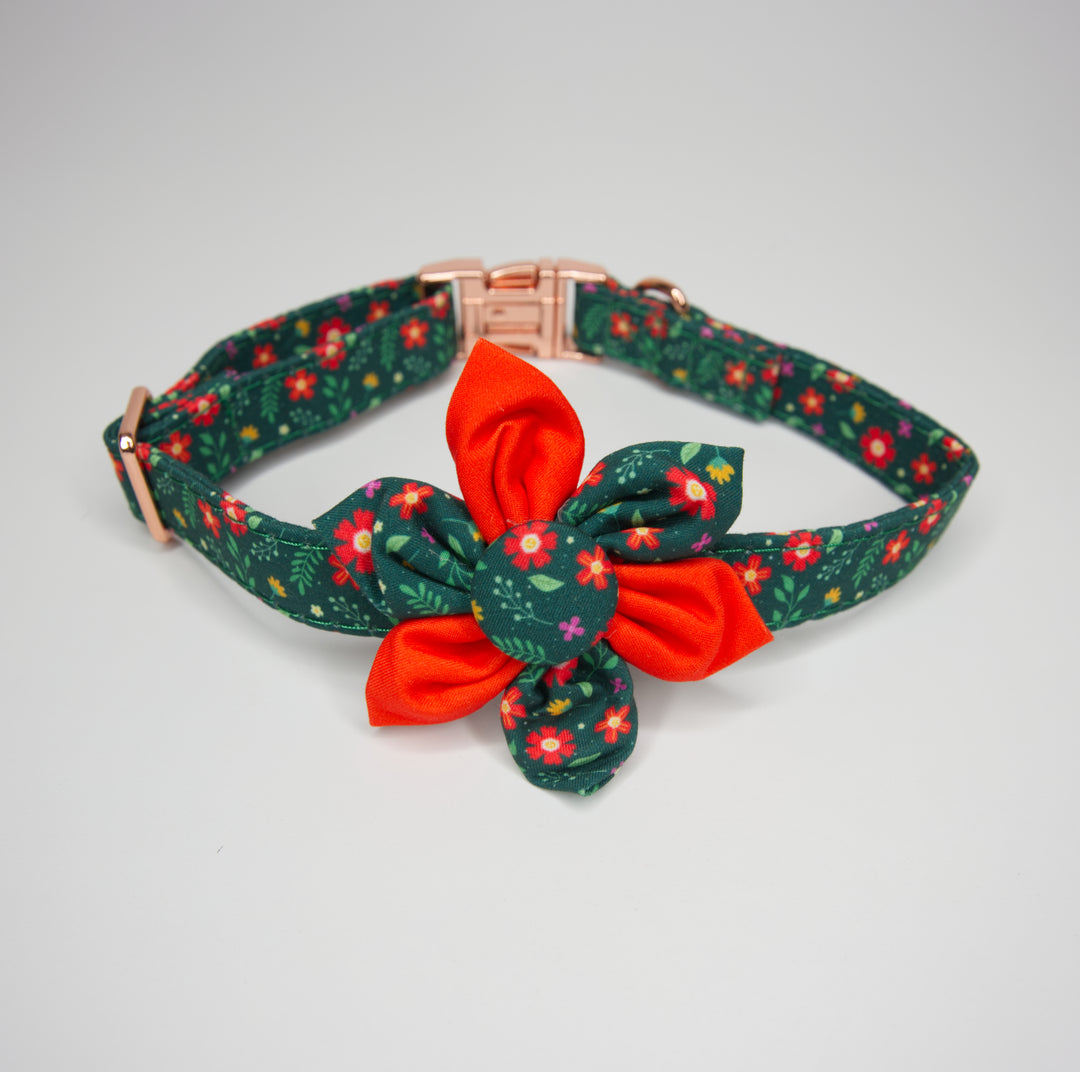 Adjustable dog collar with a yellow and orange flower design, featuring a checkered pattern with sunflowers and a metal buckle.