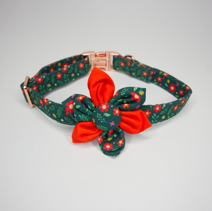 Adjustable dog collar with a yellow and orange flower design, featuring a checkered pattern with sunflowers and a metal buckle.